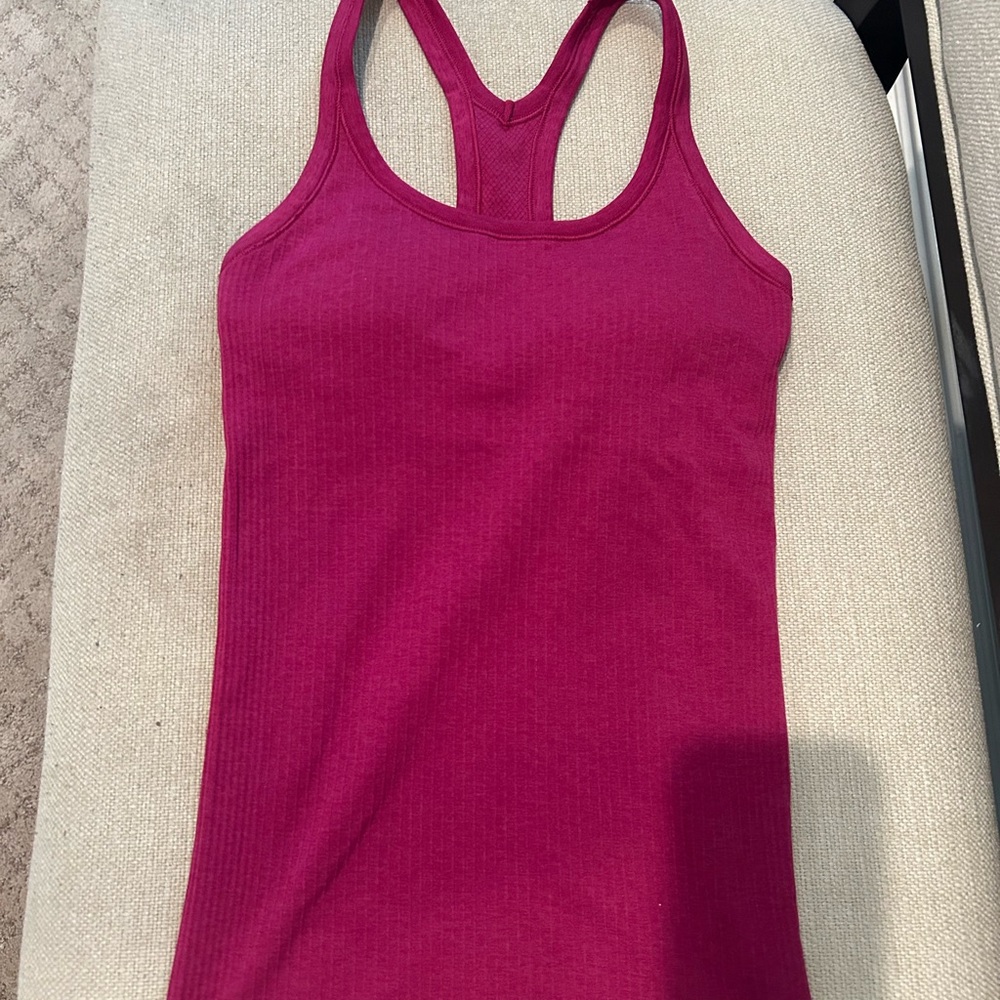 Lululemon ribbed racerback tank top with padded shelf bra. Size 2. Magenta.